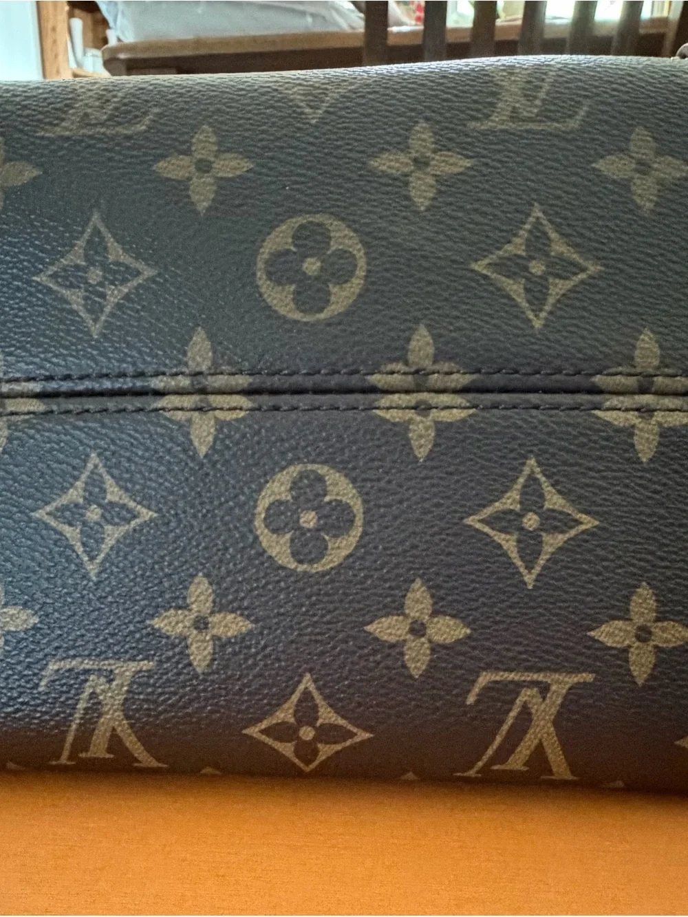 Louis Vuitton Monogram Canvas Backpack with Tan Leather Trim and Pink Charm